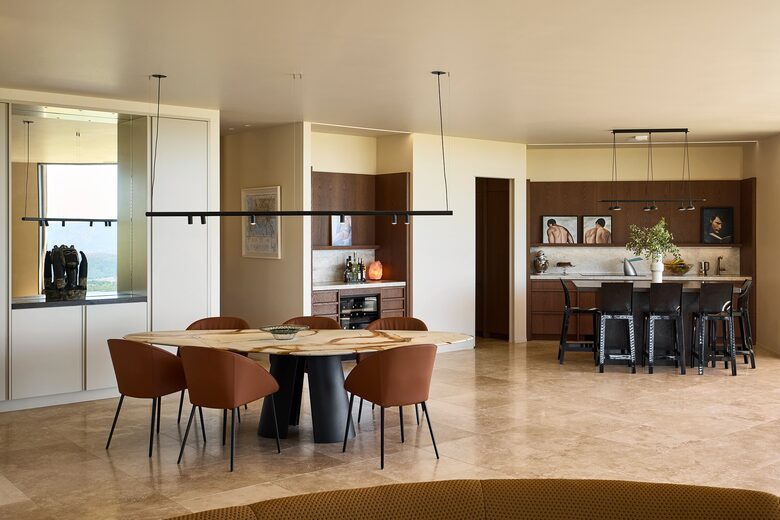 Dining room and kitchen beyond