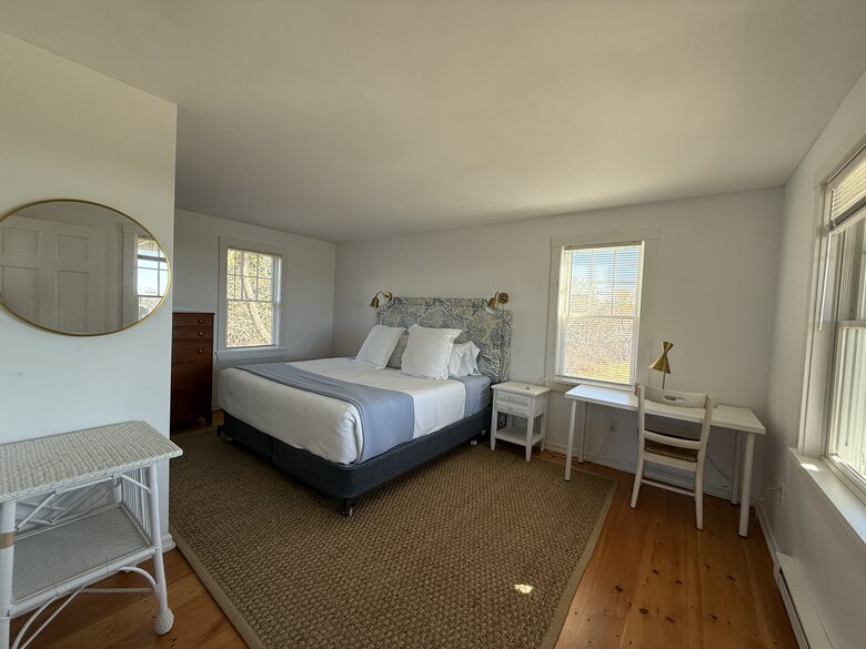 Primary bedroom with king bed and en-suite bath