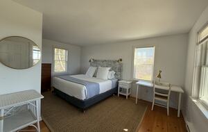 Primary bedroom with king bed and en-suite bath