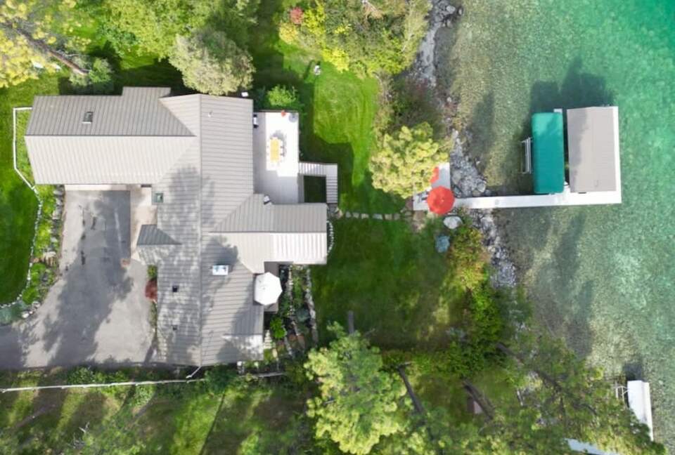 Private Flathead Lakefront Estate with Dock, Hot Tub & Panoramic Mountain Views - Rollins, Montana