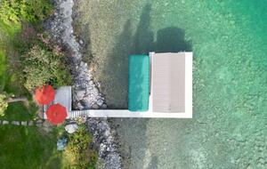 Private Flathead Lakefront Estate with Dock, Hot Tub & Panoramic Mountain Views - Rollins, Montana