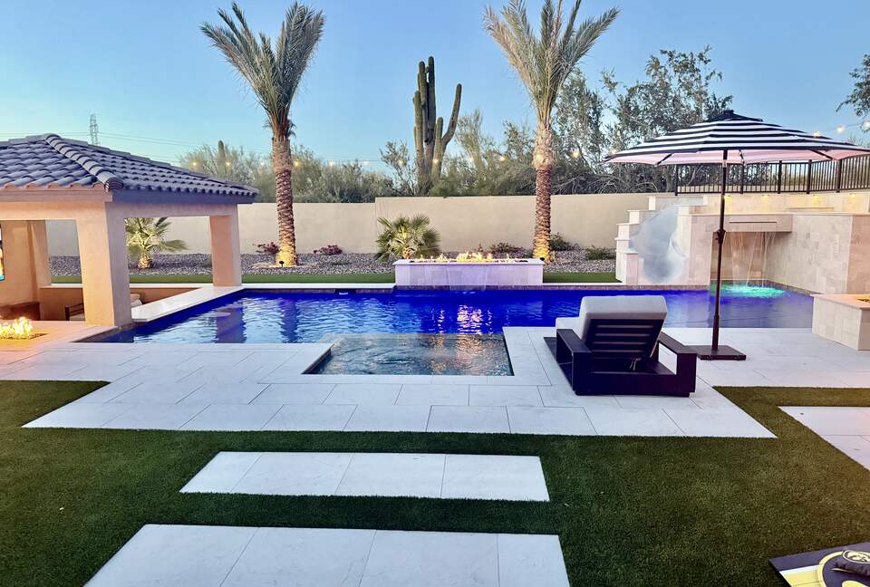 Amazing resort style backyard with heated pool and Jacuzzi