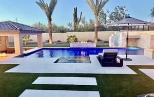 Amazing resort style backyard with heated pool and Jacuzzi