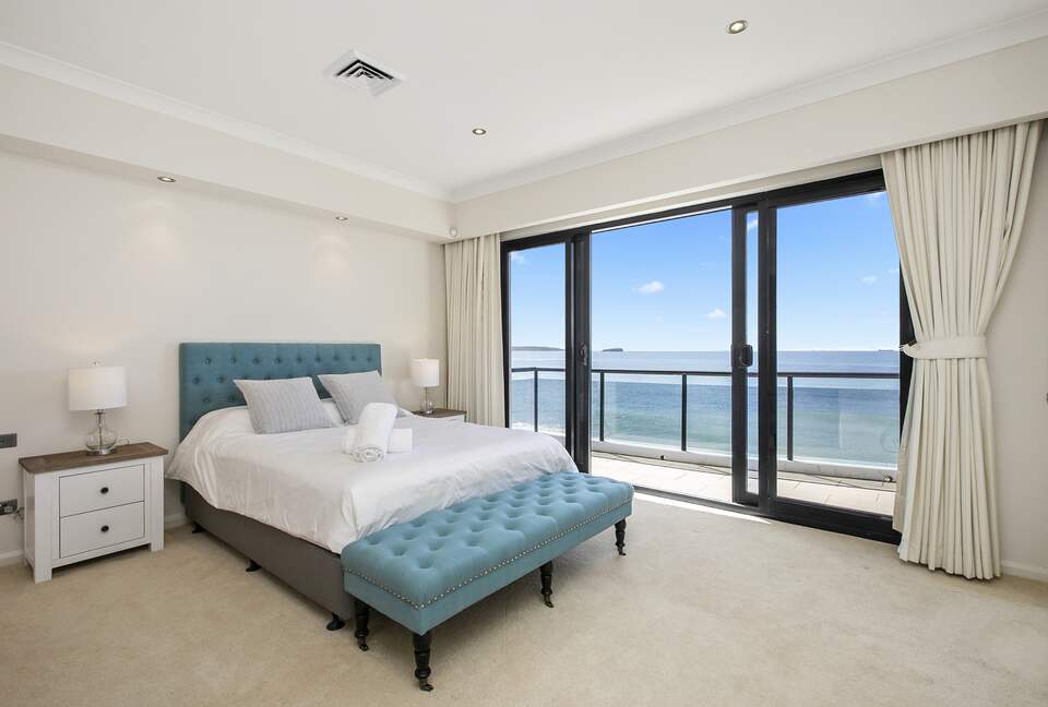 Queen bedroom with ocean views