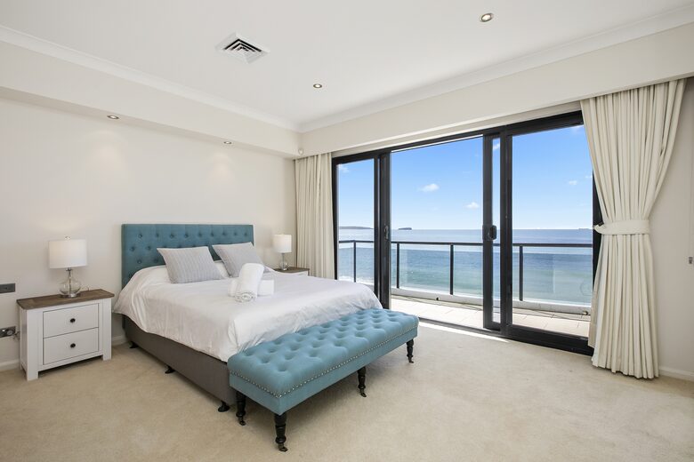 Queen bedroom with ocean views