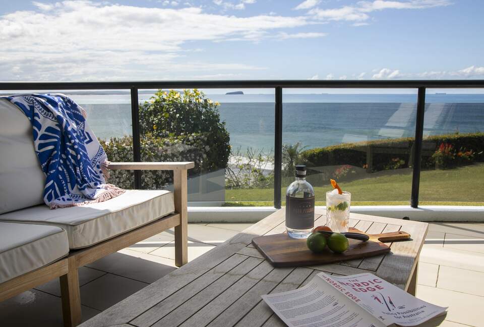 Relax on the deck with expansive ocean views