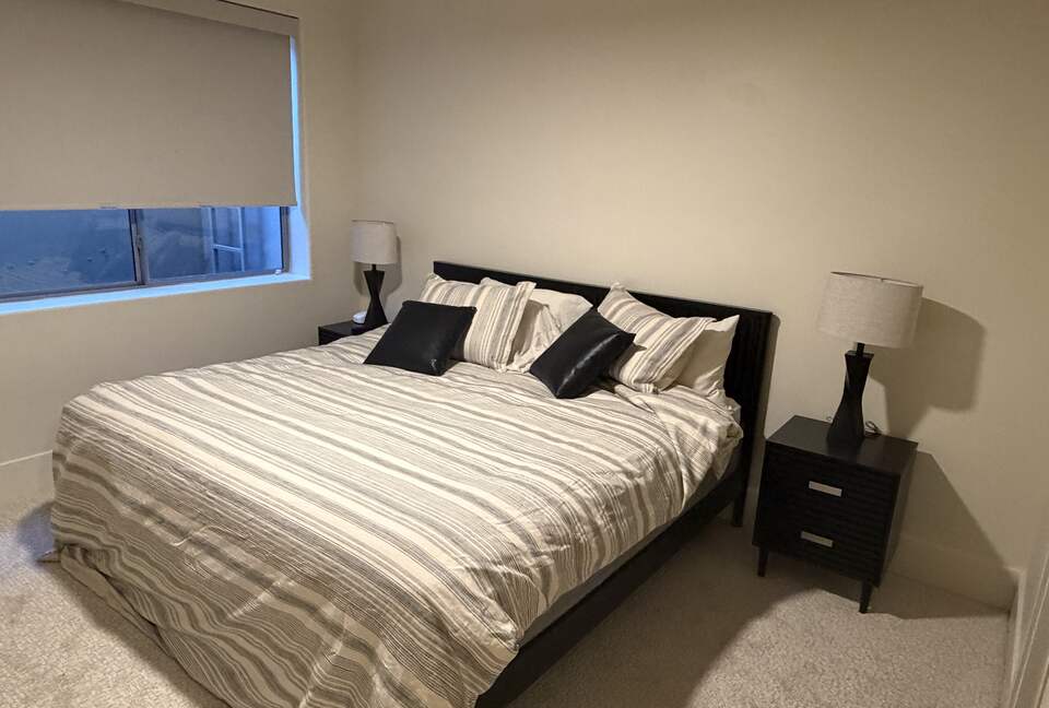 King bed with en suite bathroom