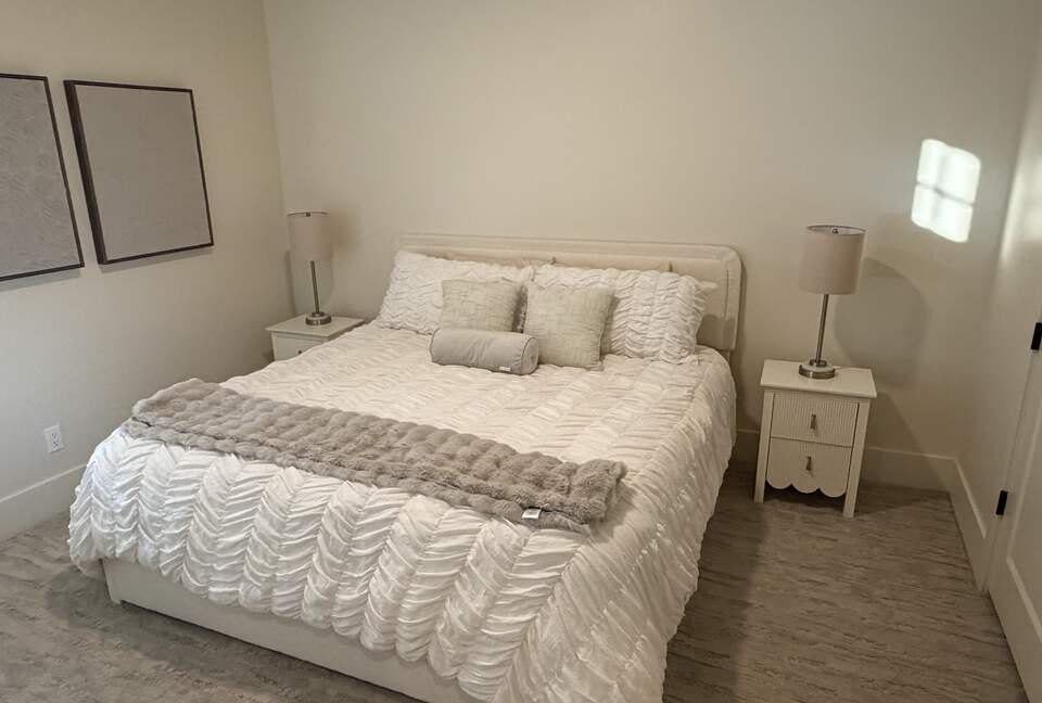 King bed with en suite bathroom