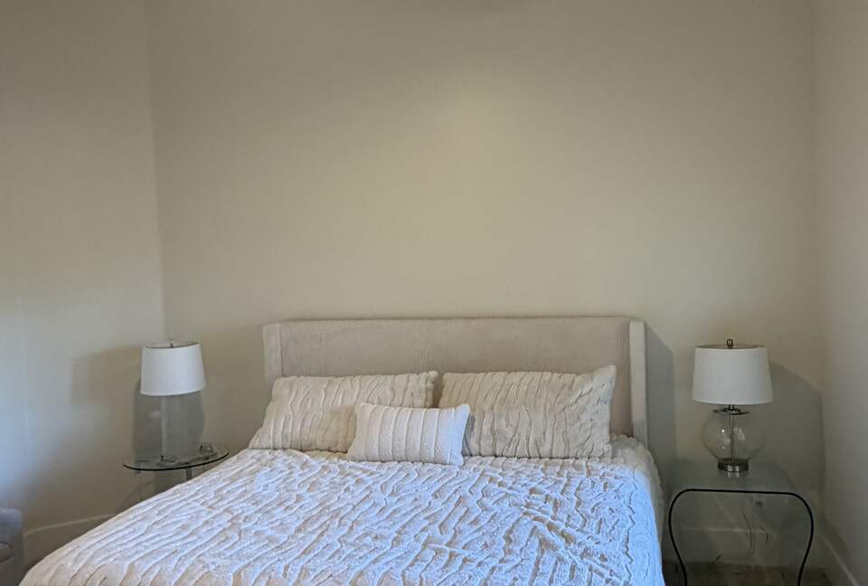 King bed with en suite bathroom