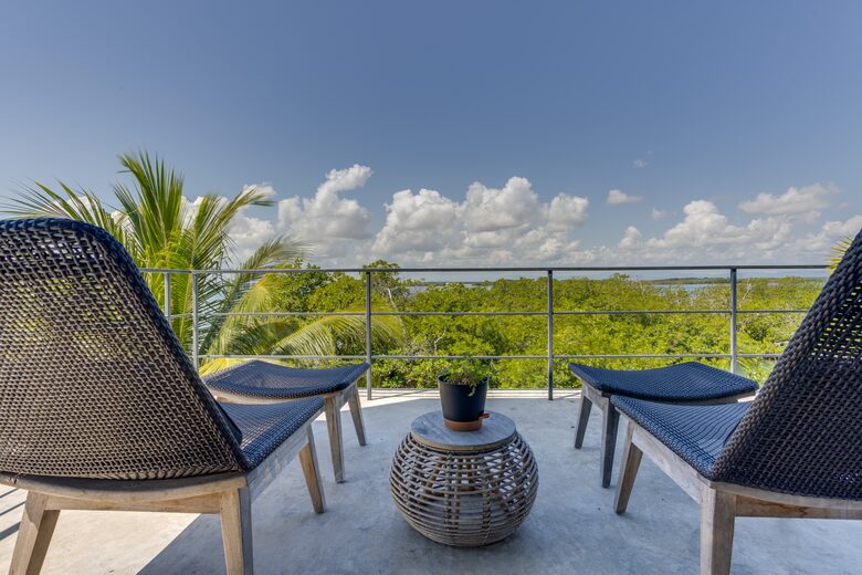 Casa Balam | Waterfront Villa with Boat, 40ft Pool & Rooftop Bar - Placencia, Belize