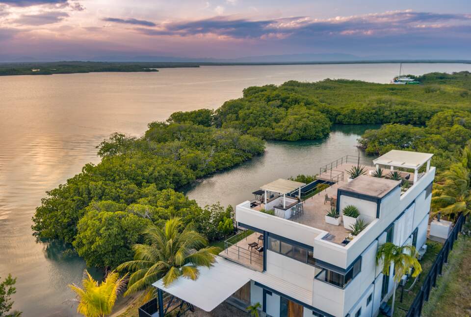 Casa Balam | Waterfront Villa with Boat, 40ft Pool & Rooftop Bar - Placencia, Belize