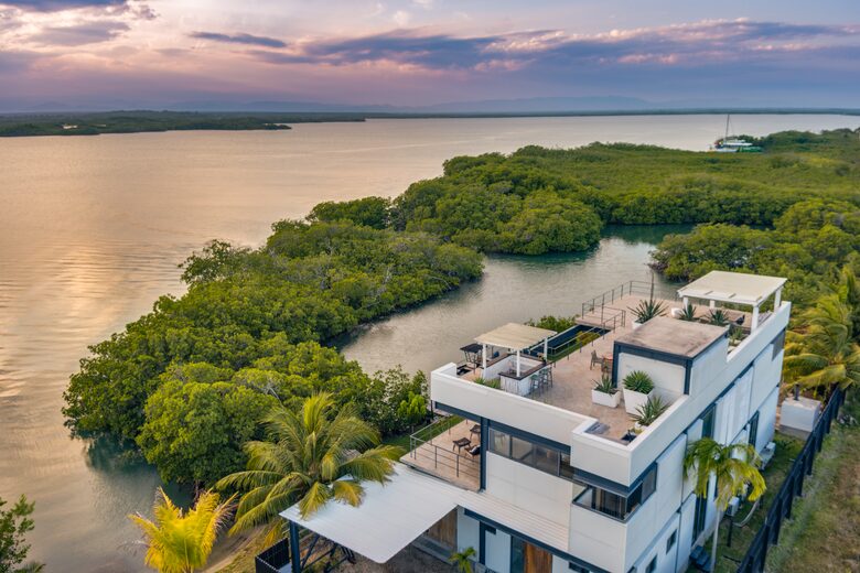 Casa Balam | Waterfront Villa with Boat, 40ft Pool & Rooftop Bar - Placencia, Belize