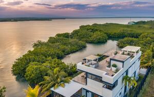 Casa Balam | Waterfront Villa with Boat, 40ft Pool & Rooftop Bar - Placencia, Belize
