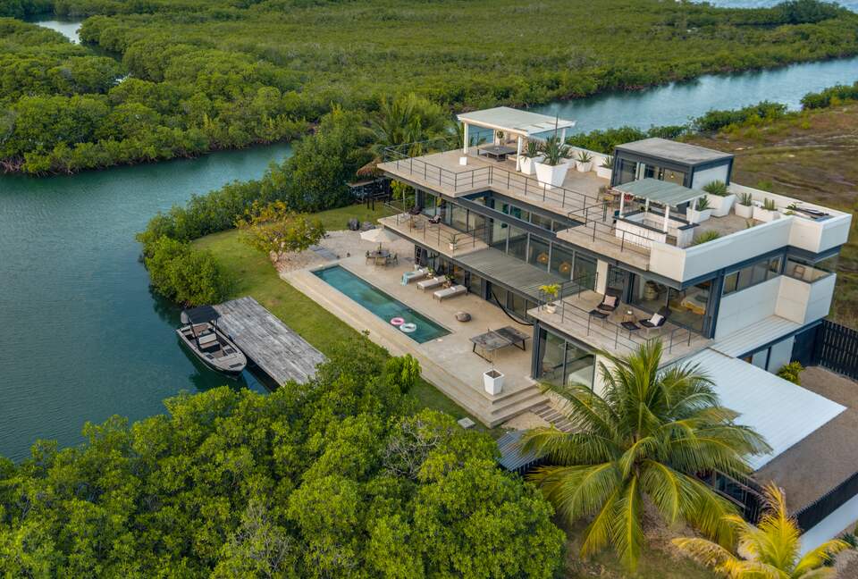 Casa Balam | Waterfront Villa with Boat, 40ft Pool & Rooftop Bar - Placencia, Belize
