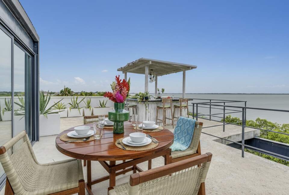Casa Balam | Waterfront Villa with Boat, 40ft Pool & Rooftop Bar - Placencia, Belize