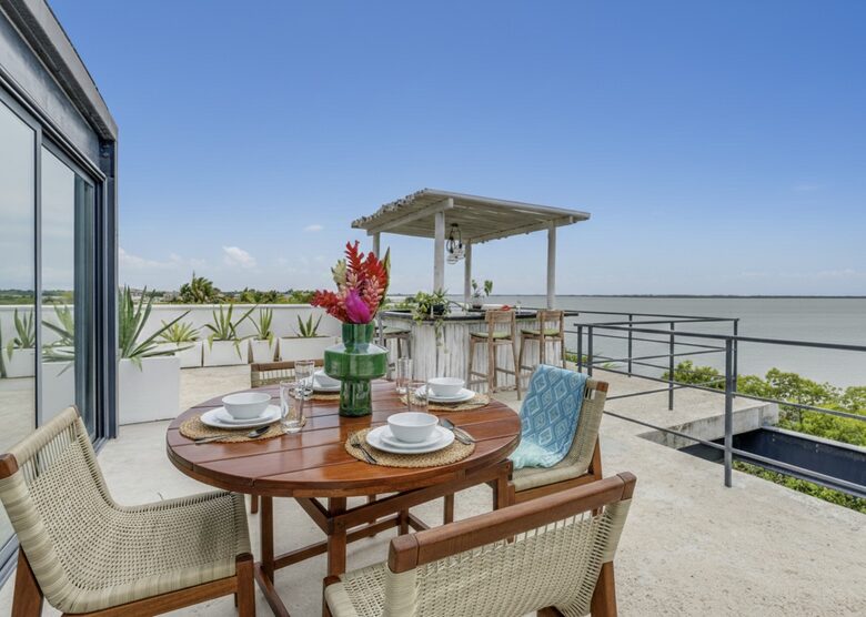 Casa Balam | Waterfront Villa with Boat, 40ft Pool & Rooftop Bar - Placencia, Belize