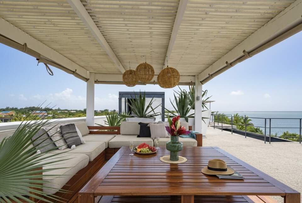 Casa Balam | Waterfront Villa with Boat, 40ft Pool & Rooftop Bar - Placencia, Belize