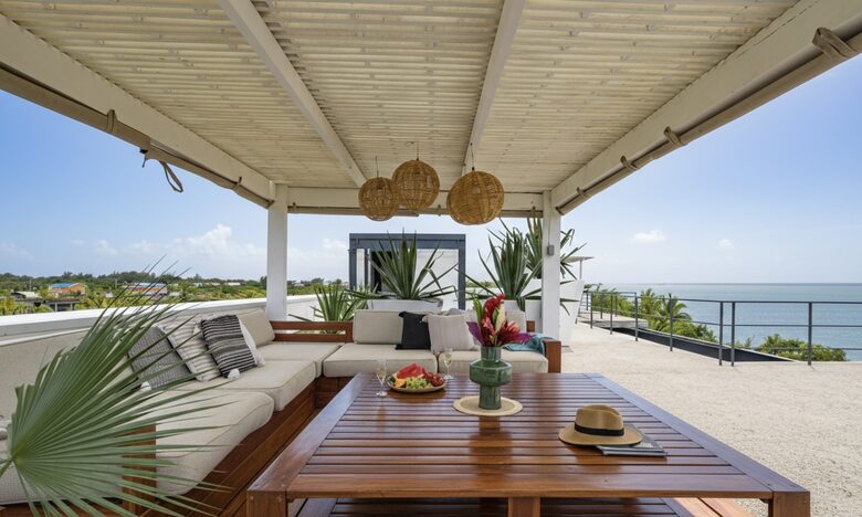 Casa Balam | Waterfront Villa with Boat, 40ft Pool & Rooftop Bar - Placencia, Belize