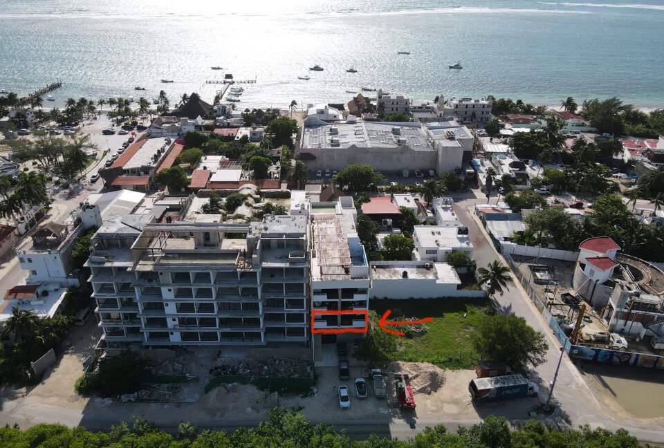 Drone view of the entire building & ocean proximity