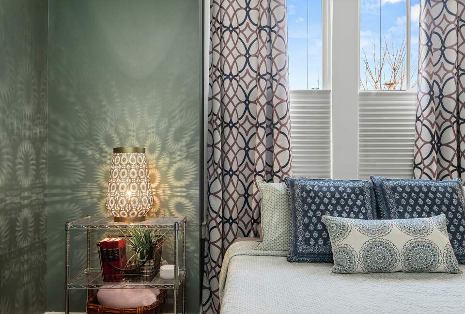 First floor guest room with Queen bed and mini crib