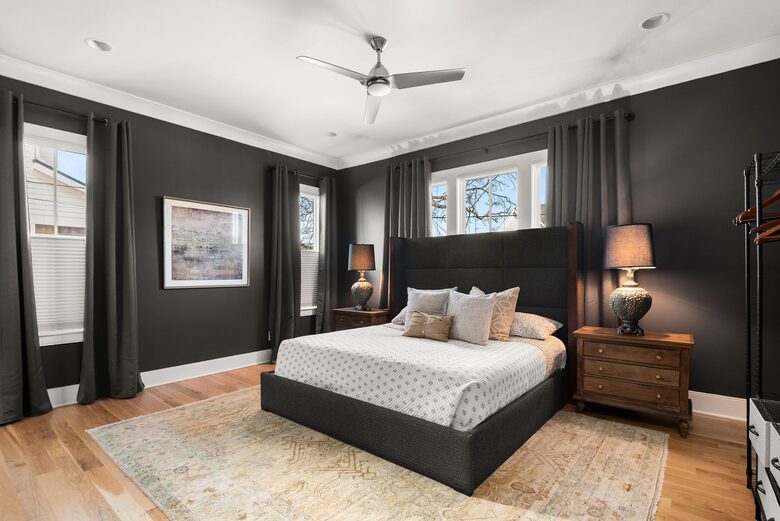 Primary suite with black out curtains and soundproofing features