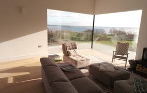 Open plan living room overlooking the lake