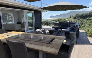 North-Facing Coastal Estate Overlooking Piha Beach - Piha, New Zealand