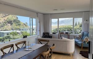 North-Facing Coastal Estate Overlooking Piha Beach - Piha, New Zealand