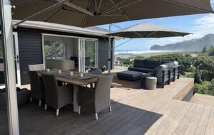 North-Facing Coastal Estate Overlooking Piha Beach - Piha, New Zealand