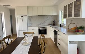 North-Facing Coastal Estate Overlooking Piha Beach - Piha, New Zealand