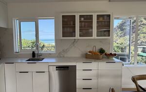 North-Facing Coastal Estate Overlooking Piha Beach - Piha, New Zealand