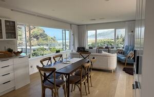North-Facing Coastal Estate Overlooking Piha Beach - Piha, New Zealand