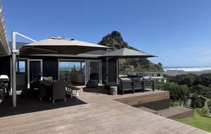 North-Facing Coastal Estate Overlooking Piha Beach - Piha, New Zealand