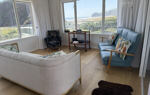 North-Facing Coastal Estate Overlooking Piha Beach - Piha, New Zealand