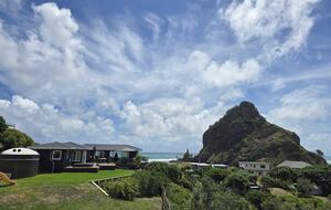 North-Facing Coastal Estate Overlooking Piha Beach - Piha, New Zealand