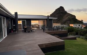North-Facing Coastal Estate Overlooking Piha Beach - Piha, New Zealand
