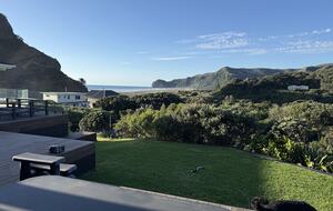 North-Facing Coastal Estate Overlooking Piha Beach - Piha, New Zealand
