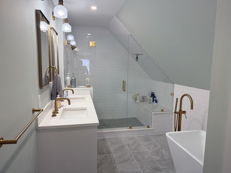 Second master bathroom with shower and small tub