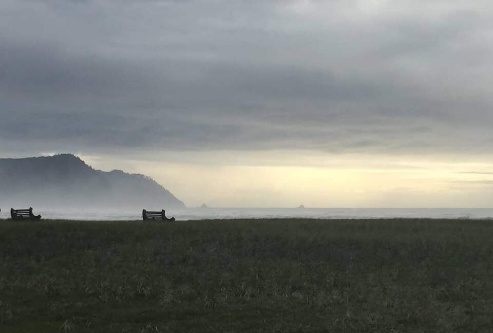 Enjoy watching the waves from the benches, a short walk from the house