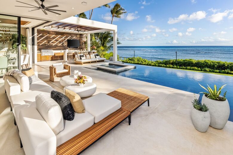 Relax and enjoy the ocean breeze on the lanai.