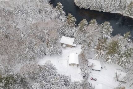 Private Riverfront Sanctuary within a Snowy Forest Canvas