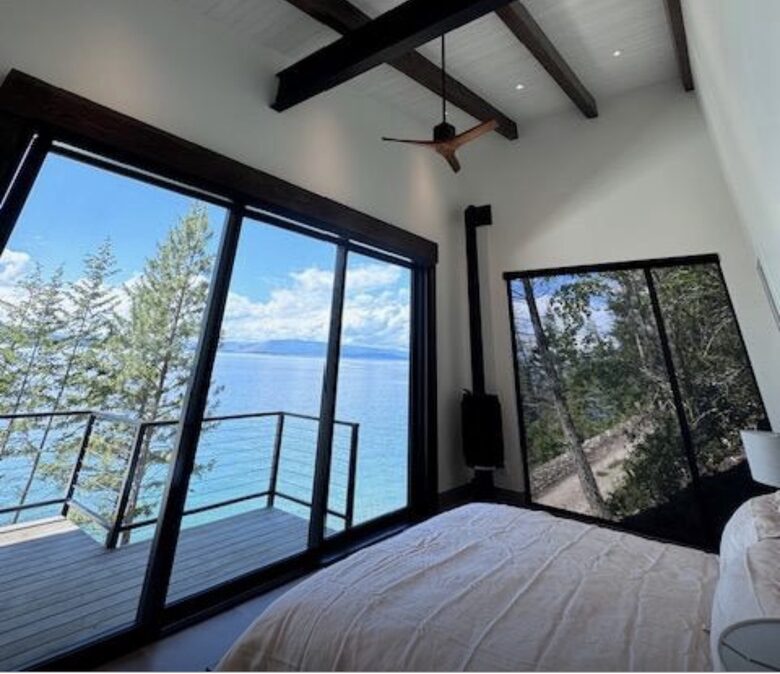 Primary bedroom with balcony