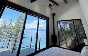 Primary bedroom with balcony