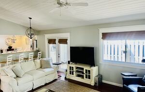 French doors open up to outdoor grill