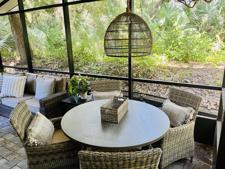 secluded patio leads to path to beach