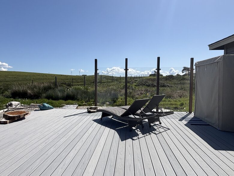 Back deck with view of cow pasture