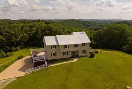Two-Story Sunroom Above Strouds Run - Athens, Ohio
