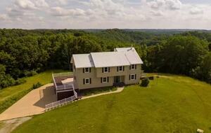 Two-Story Sunroom Above Strouds Run - Athens, Ohio