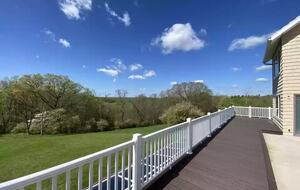 Two-Story Sunroom Above Strouds Run - Athens, Ohio