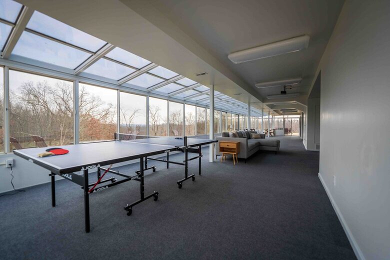 Two-Story Sunroom Above Strouds Run - Athens, Ohio